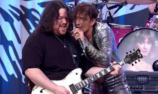 Wolfgang Van Halen and Justin Hawkins of The Darkness performing at the Taylor Hawkins tribute concert