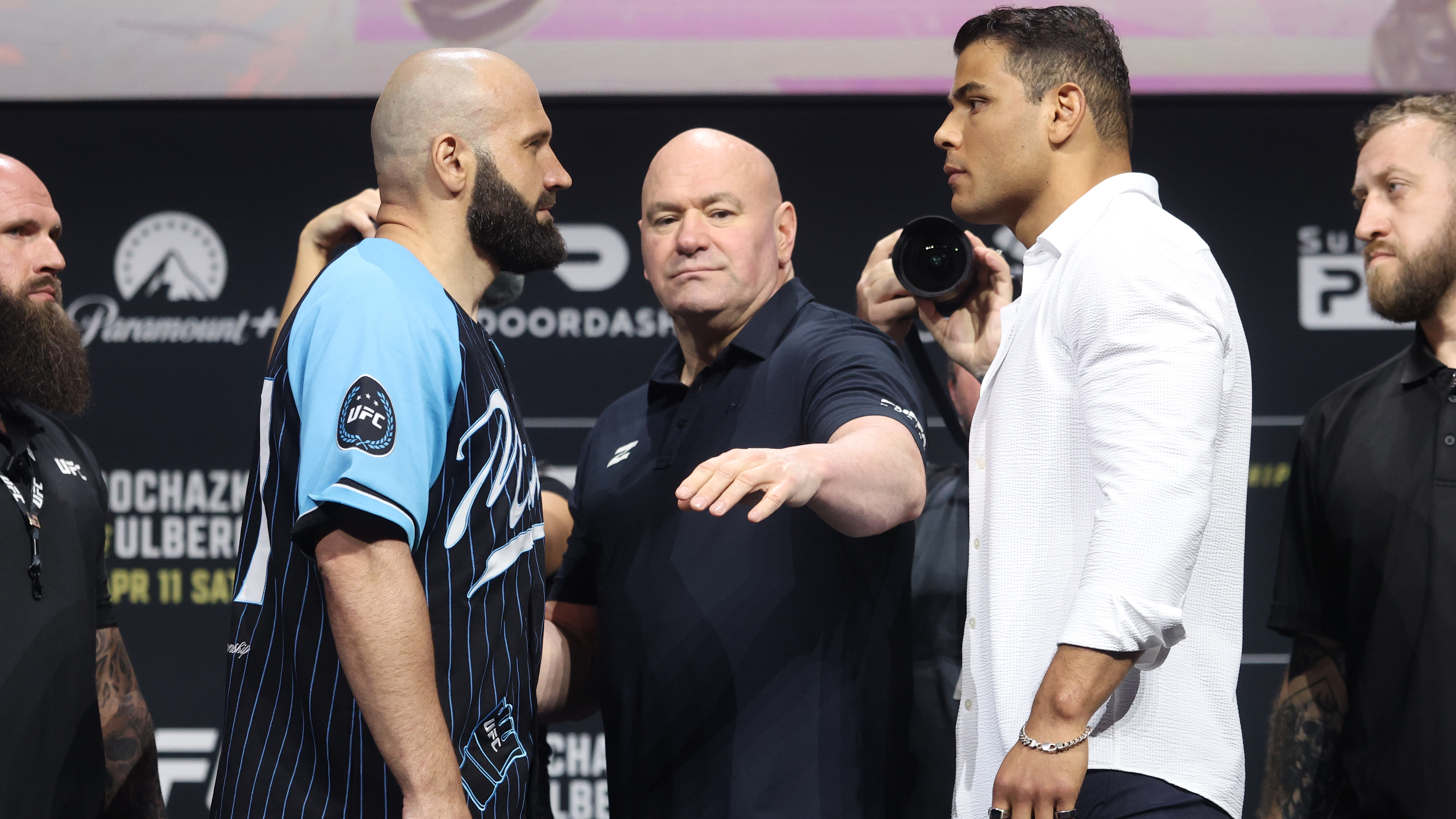 Opponents Azamat Murzakanov of Russia and Paulo Costa of Brazil face off during the UFC 327 press conference at Kaseya Center