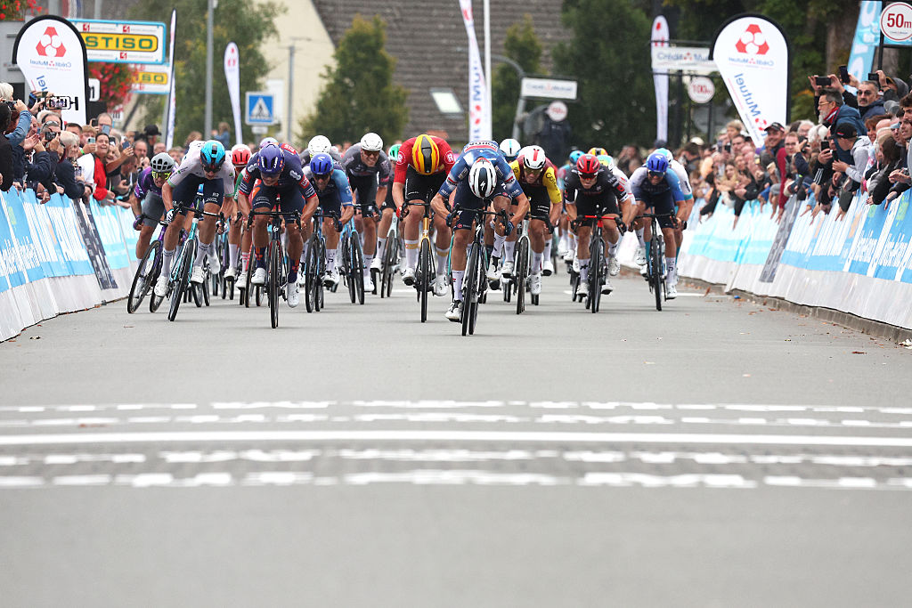 FOURMIES, FRANCE - SEPTEMBER 14: A general view of Paul Magnier of France and Team Soudal Quick-Step, Pavel Bittner of Czech Republic and Team Picnic PostNL, Yevgeniy Fedorov of Kazakhstan and Team XDS Astana, Milan Fretin of Belgium and Team Cofidis, Dylan Groenewegen of Netherlands and Team Jayco AlUla and Soren Waerenskjold of Norway and Team Uno-X Mobility sprint at finish line during the 92nd GP de Fourmies / La Voix du Nord 2025 a 193km one day race from Fourmies to Fourmies on September 14, 2025 in Fourmies, France. (Photo by Rhode Van Elsen/Getty Images)