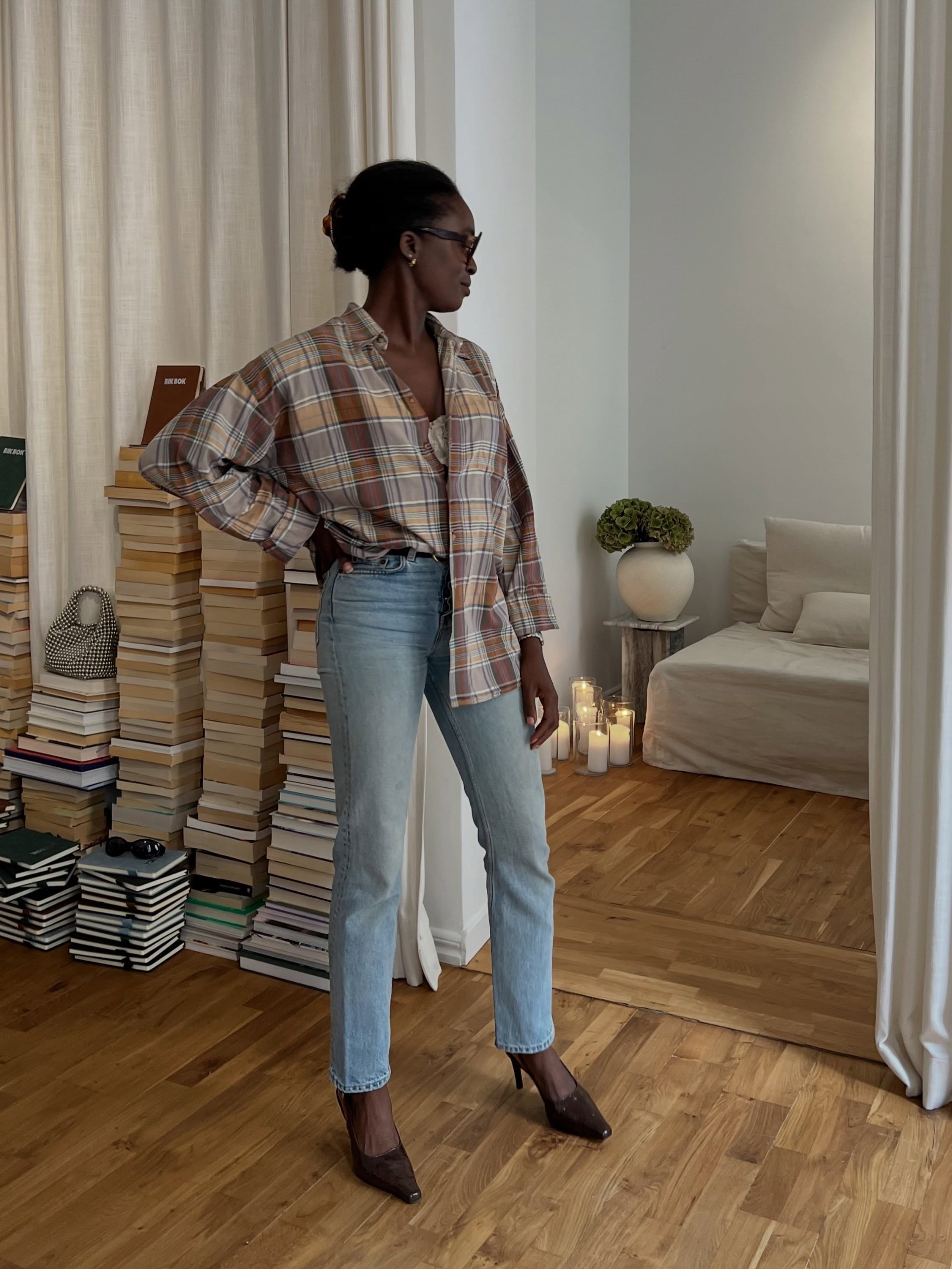 A woman wearing a new fall 2026 denim outfit idea.