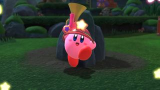 Kirby jumping into the hair holding a megaphone