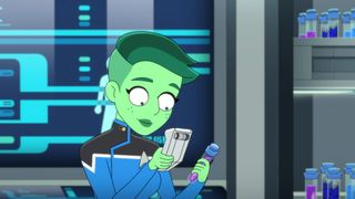 A green-skinned alien woman holding a test tube and scientific device.