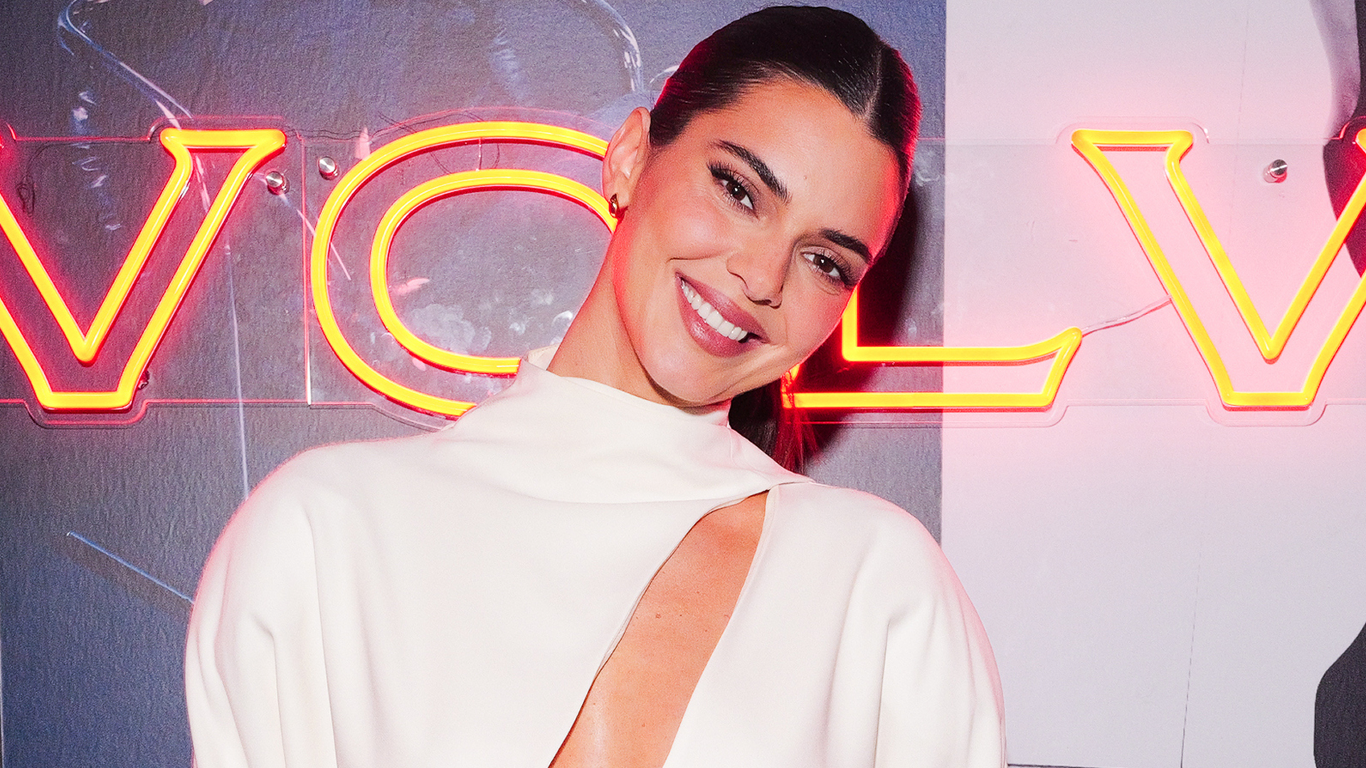 Kendall Jenner attended a Revolve event at Paris Fashion Week in a cut-out turtleneck and black trousers