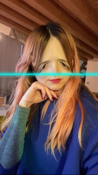 Digital makeup artist ines alpha using time warp instagram filter to warp her face