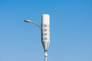 A small cell antenna for 5G wireless network installed on street lamp post