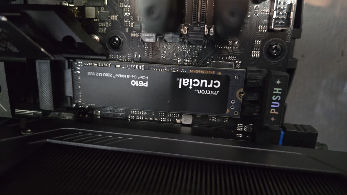 A Crucial P510 SSD installed in a gaming PC.