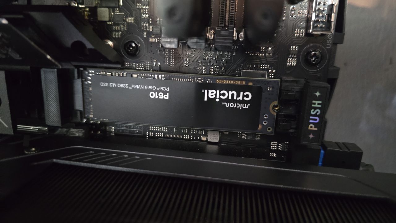 A Crucial P510 SSD installed in a gaming PC.