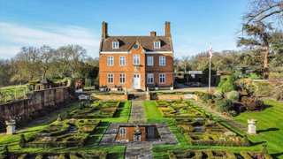 Impressive Jacobean house surrounded by gardens