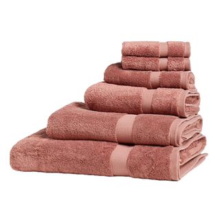 Stack of orange bath towels