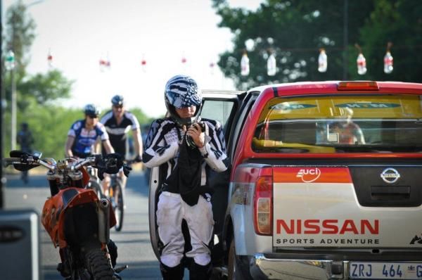 Tim Fair, lead motorbike rider, gets ready before the start