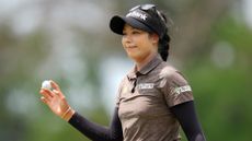 Patty Tavatanakit of Thailand acknowledges the gallery after the eagle on the 7th green during the third round of the Honda LPGA Thailand