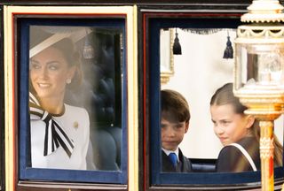 Kate Middleton and her children louis and charlotte attend trooping the colour