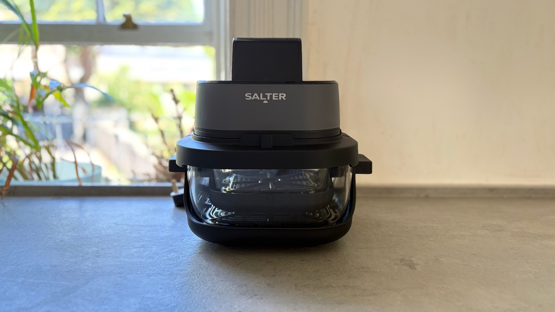 The Salter Crisp &amp;amp; Go Portable Air Fryer on the counter