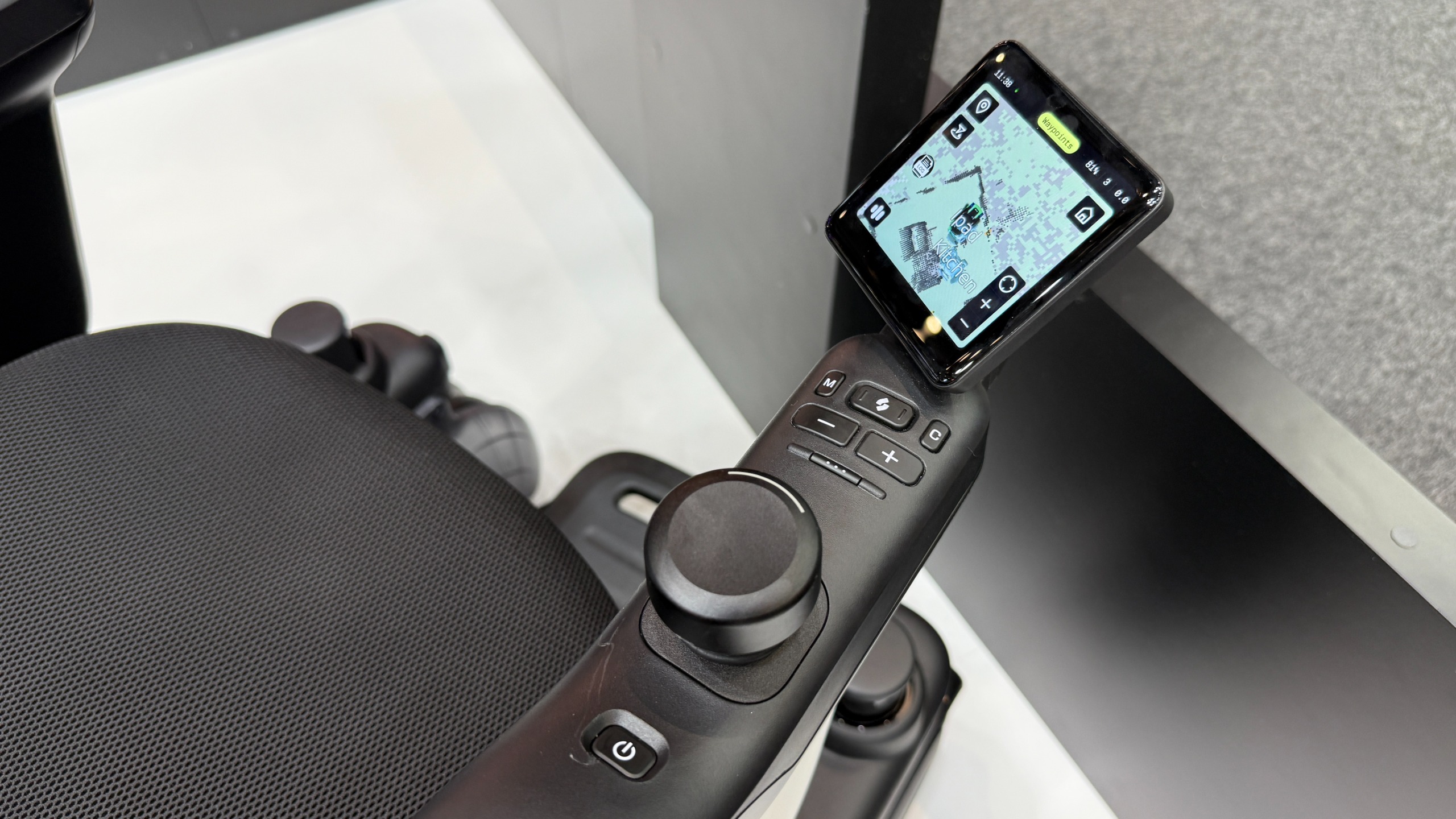 The Strutt ev1c's controls on the arm, with the touchscreen