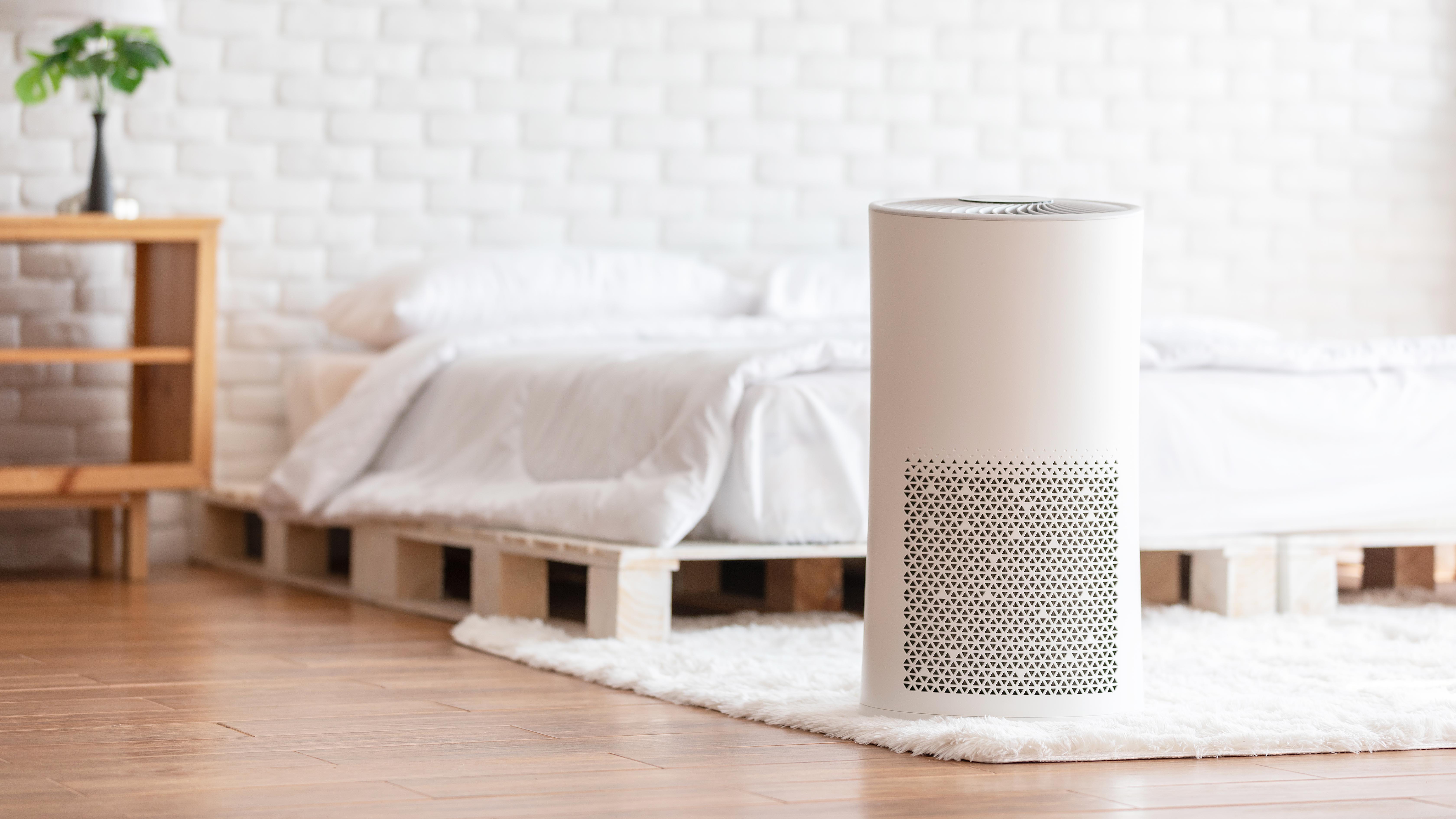 an air purifier in a bedroom