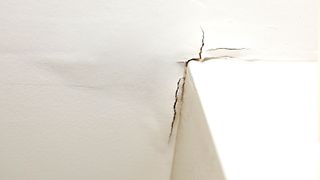 Crack at top of white corner wall where it meets ceiling