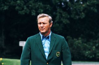 Arnold Palmer wearing The Masters green jacket
