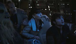 Qi'ra and the crew looking concerned in space