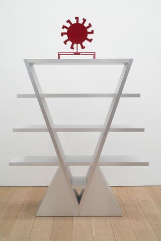 Metal V shaped shelves by Ryan Preciado