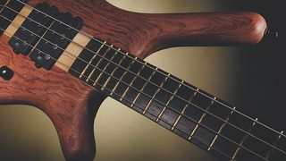 Best bass for metal: natural Warwick bass on yellow background
