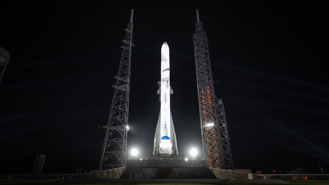 a rocket on the launch pad in darkness