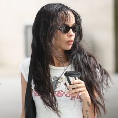 Zo&euml; Kravitz's 'Caught Stealing' press tour continued in a street style look, plus the peep-toe shoe trend