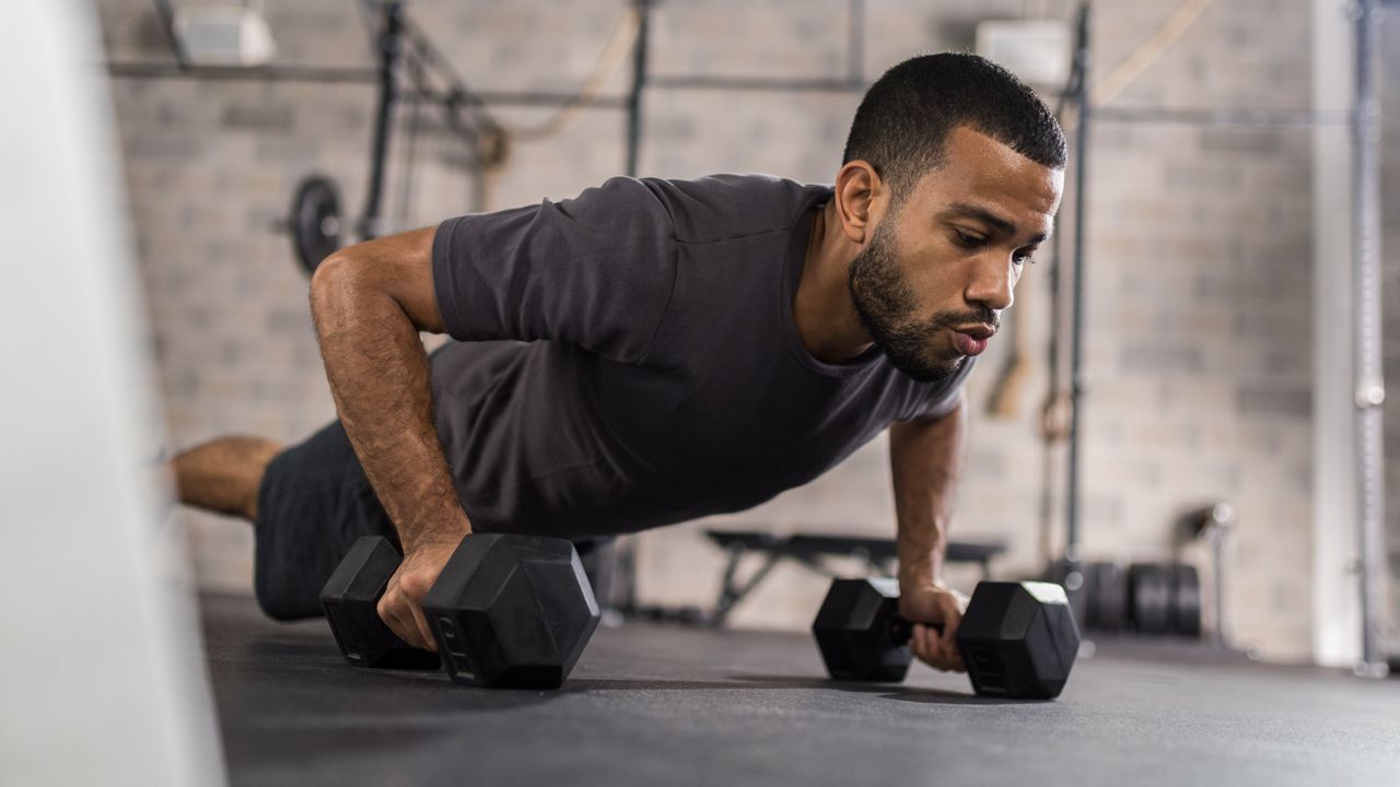 Man doing a dumbbell workout