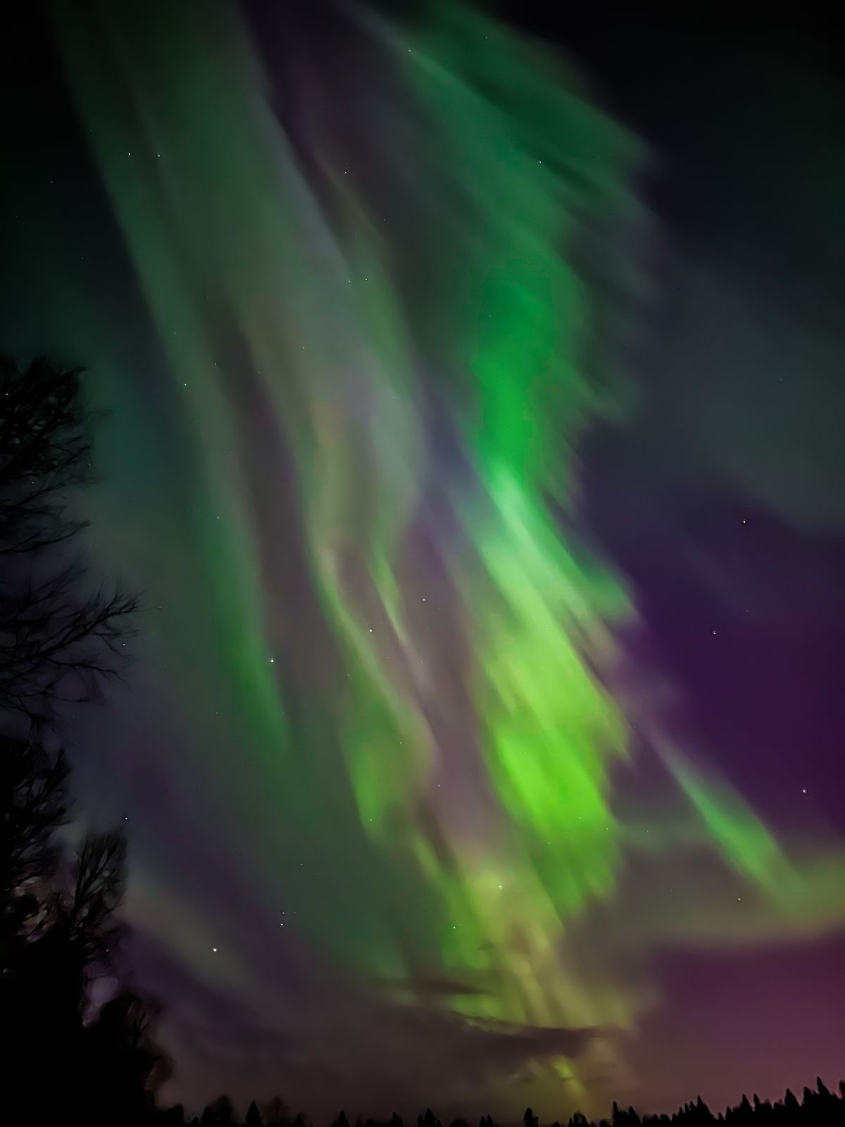 dancing ribbons of light fill the sky as the northern lights put on a show in Finland.