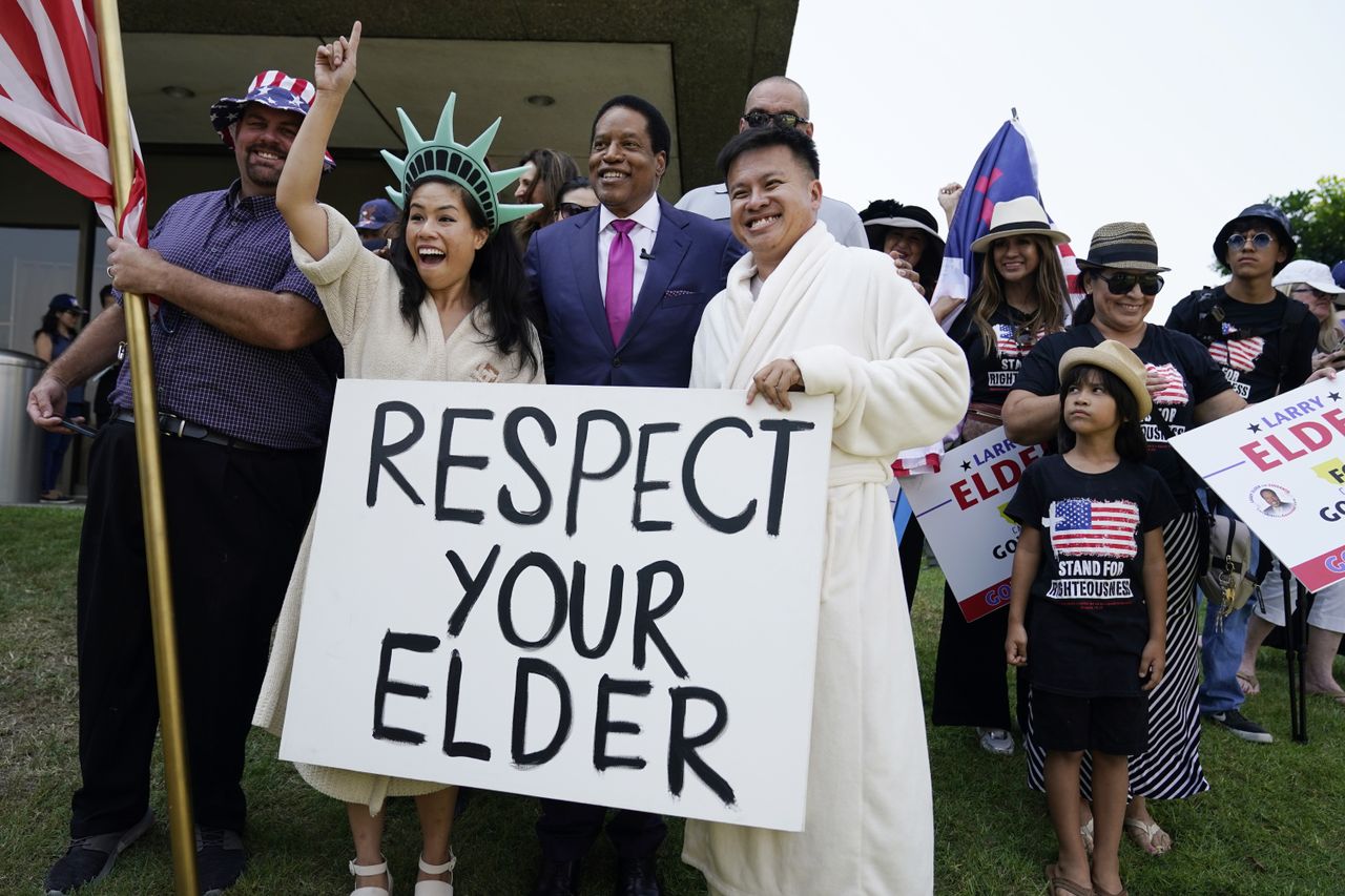 Larry Elder and two fans.