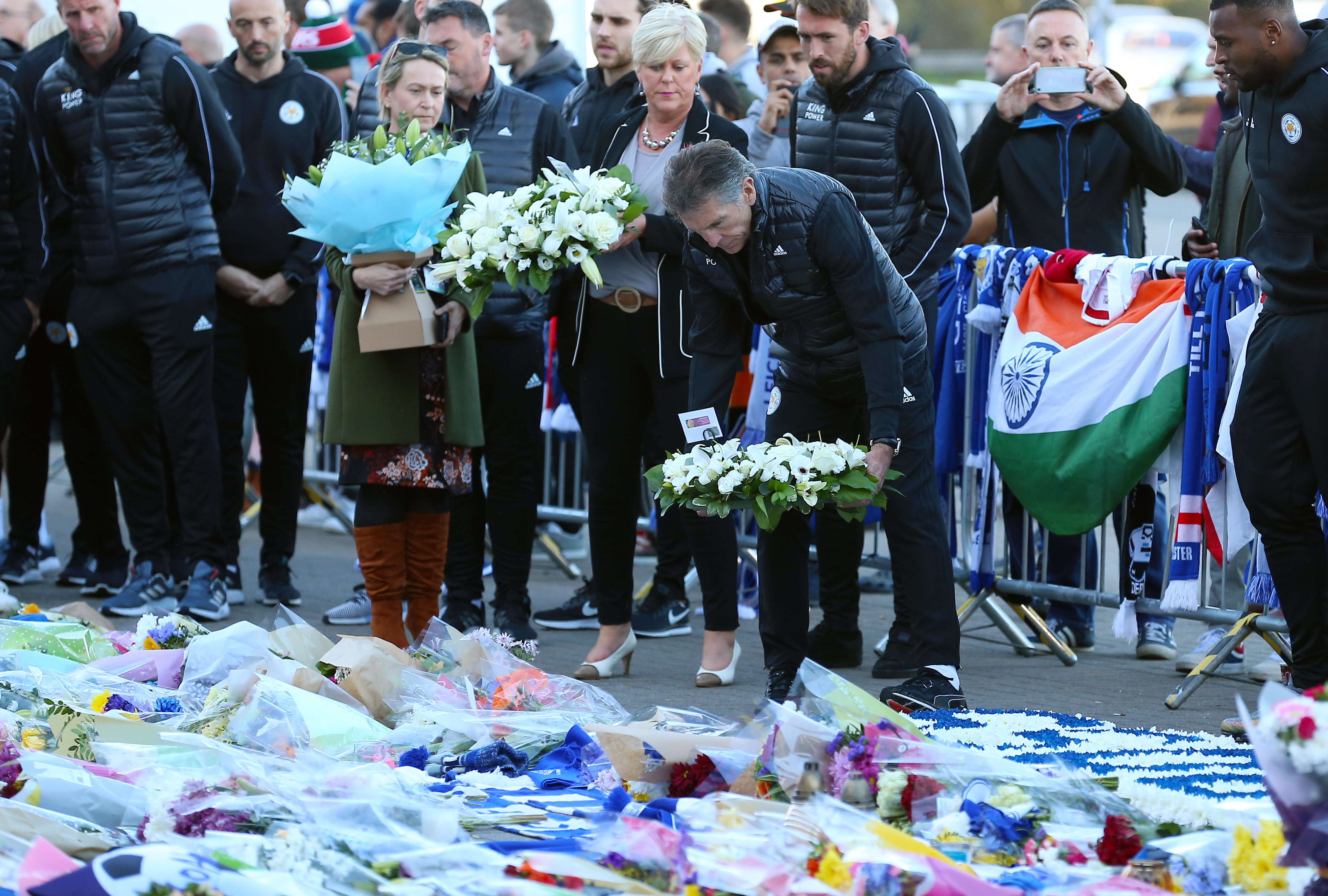Claude Puel lays a wreath in honour of Vichai Srivaddhanaprabha