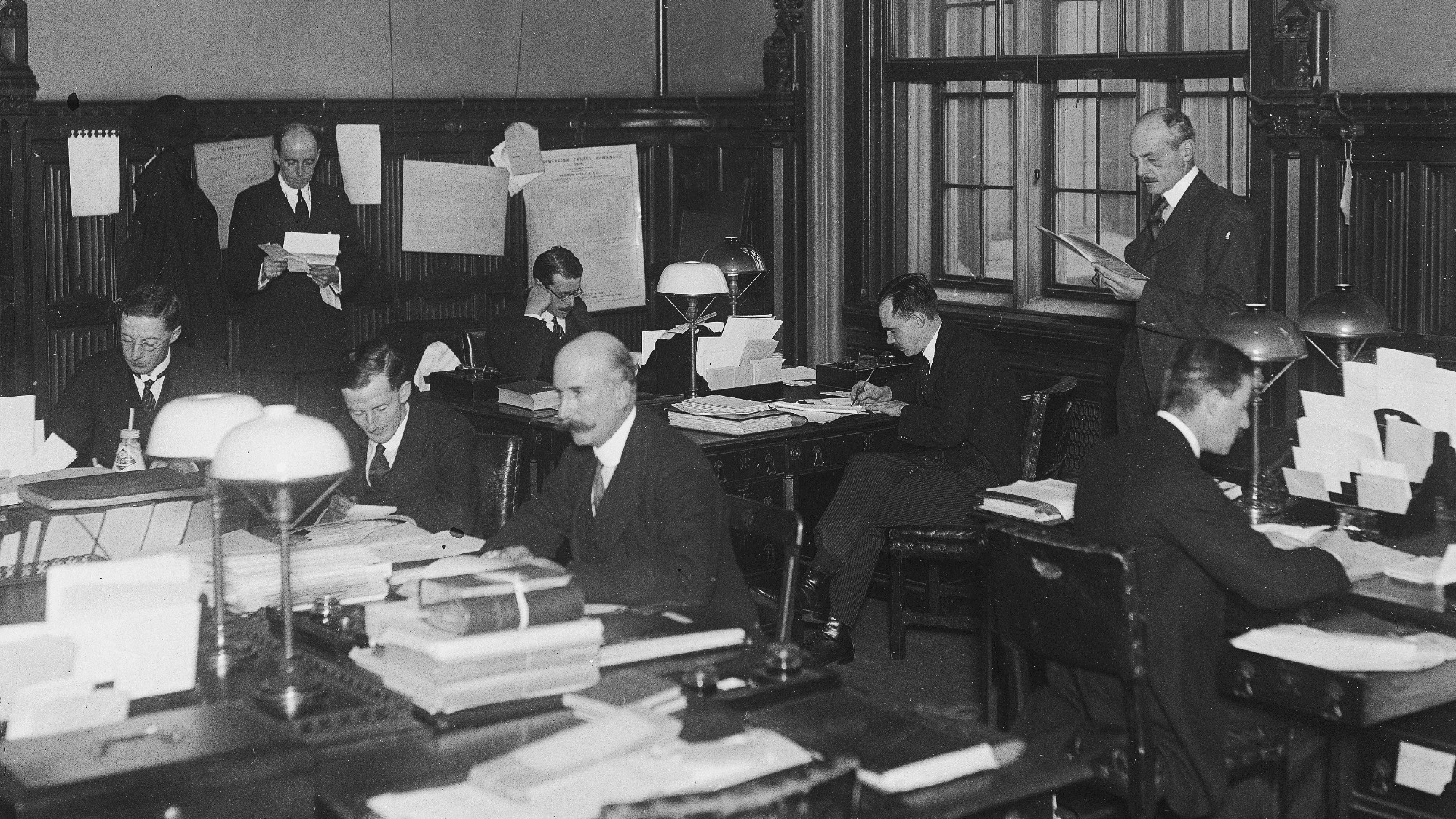Civil servants at work in the House of Commons committee office in London, November 1919