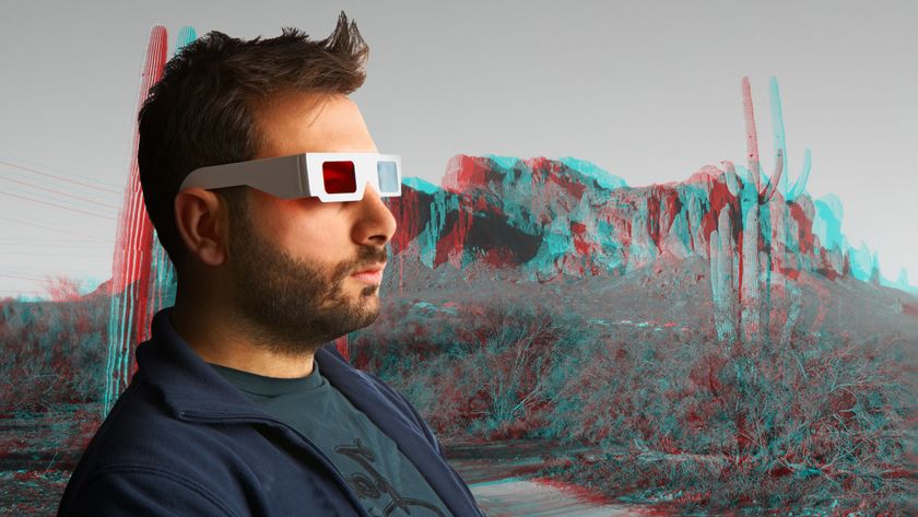 A man wearing old red-blue paper 3D glasses on a color-split countryside background.