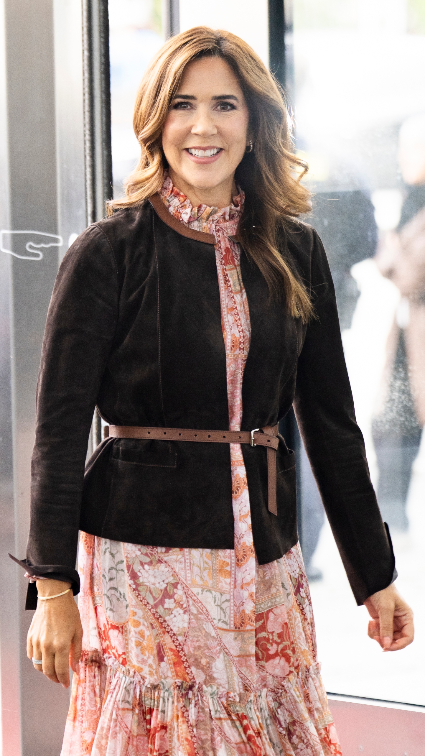 Queen Mary of Denmark smiles as she attends the Nordic Rare Disease Summit