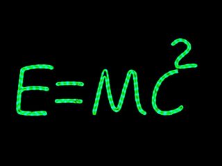 Einstein's famous equation, E=mc2, written on a chalkboard