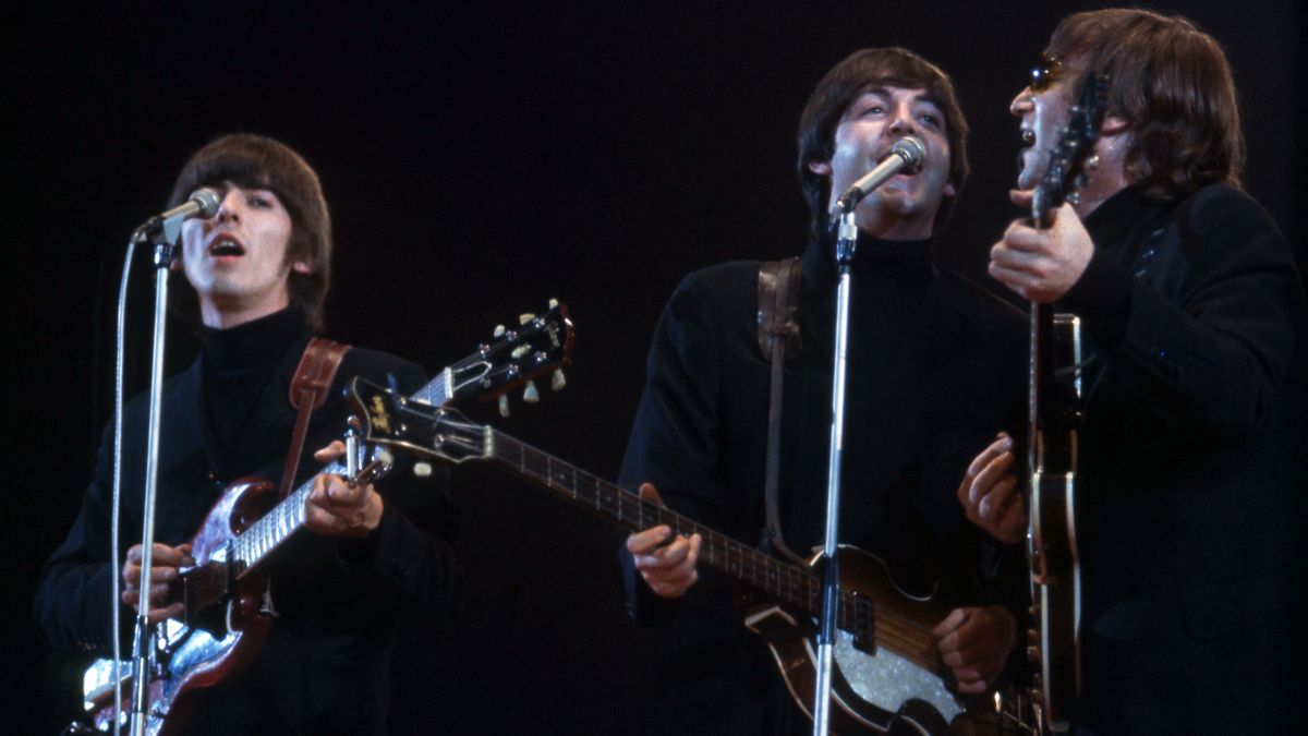 George Harrison (1943-2001), Paul McCartney and John Lennon (1940-1980) of The Beatles perform at Empire Pool in Wembley at the New Musical Express Annual Poll Winner&#039;s Concert in what would be their final scheduled performance in England, on May 1, 1966, in London, U