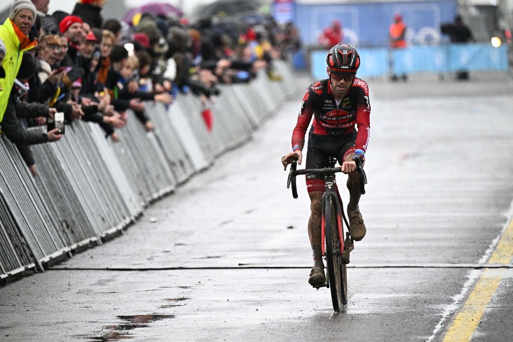Belgian rider Eli Iserbyt crosses the finish line of the mens elite race Duinencross Koksijde Cyclocross of Dunes in Koksijde on January 5 2023 Belgium OUT Photo by JASPER JACOBS BELGA AFP Belgium OUT Photo by JASPER JACOBSBELGAAFP via Getty Images