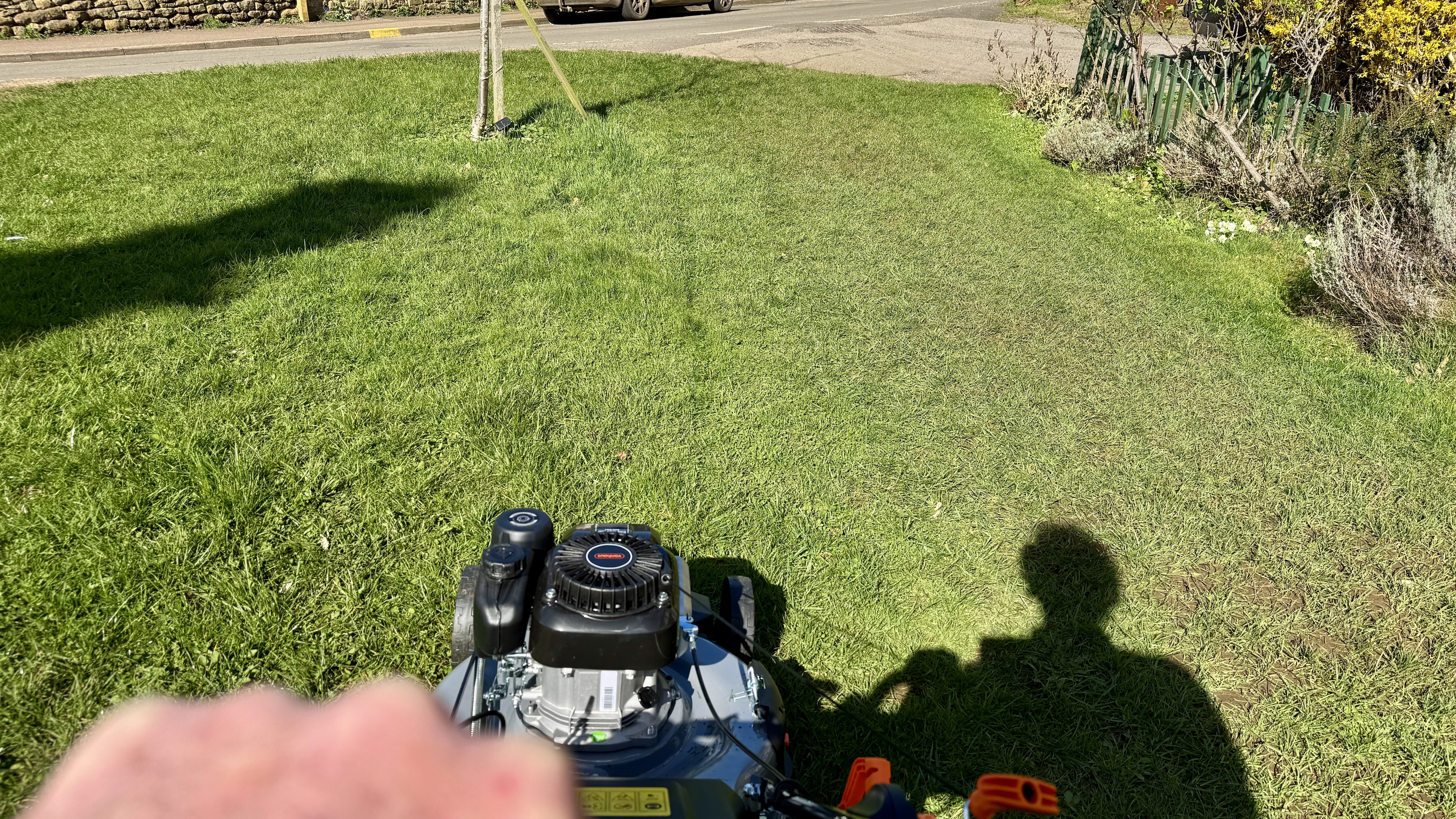 Vonhaus 171cc Petrol Lawn Mower being used on lawn
