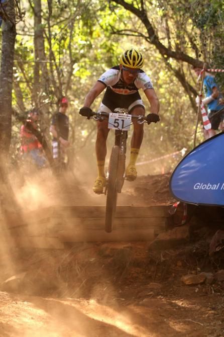 An Orange Monkey-Cannondale rider racing in China