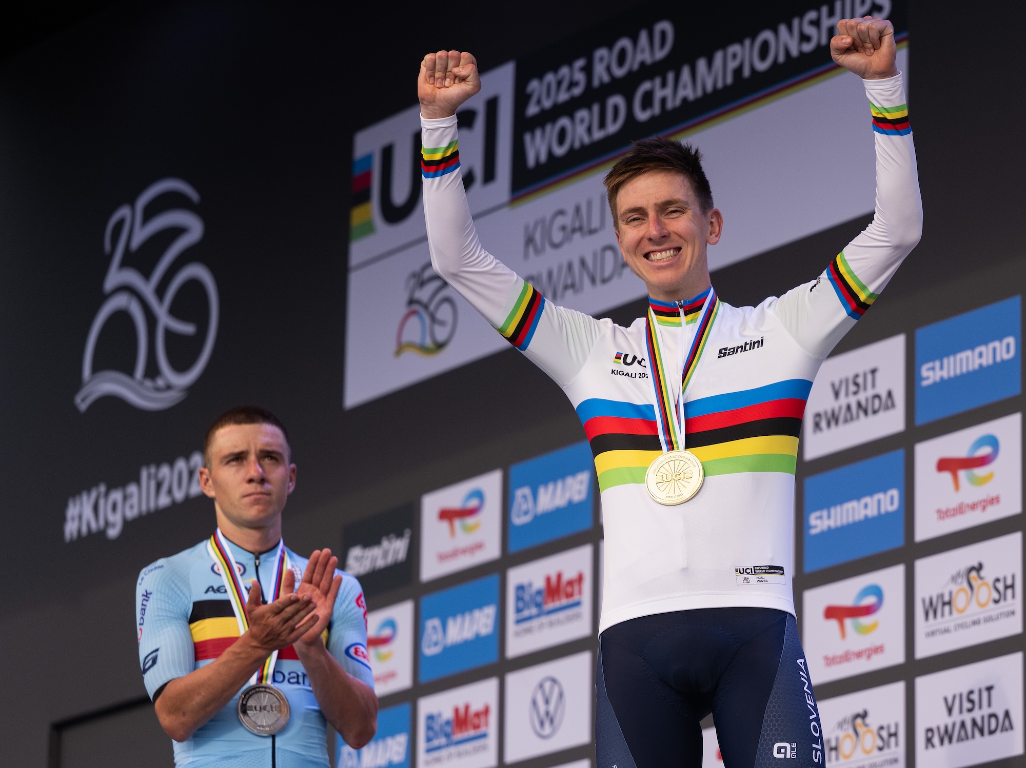 KIGALI, RWANDA - SEPTEMBER 28: Gold medalist Tadej Pogacar and Team Slovenia celebrates next to silver medalist Remco Evenepoel and Team Belgium on the podium during the medal ceremony after the 98th UCI Cycling World Championships Kigali 2025, Men Elite Road Race a 267.5km race from Kigali to Kigali on September 28, 2025 in Kigali, Rwanda. (Photo by David Ramos/Getty Images)