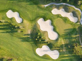 Aerial view of a tough hole at a golf course