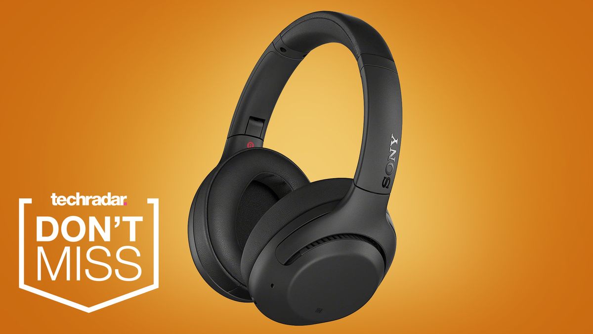 the sony wh-xb900n headphones in black on an orange background