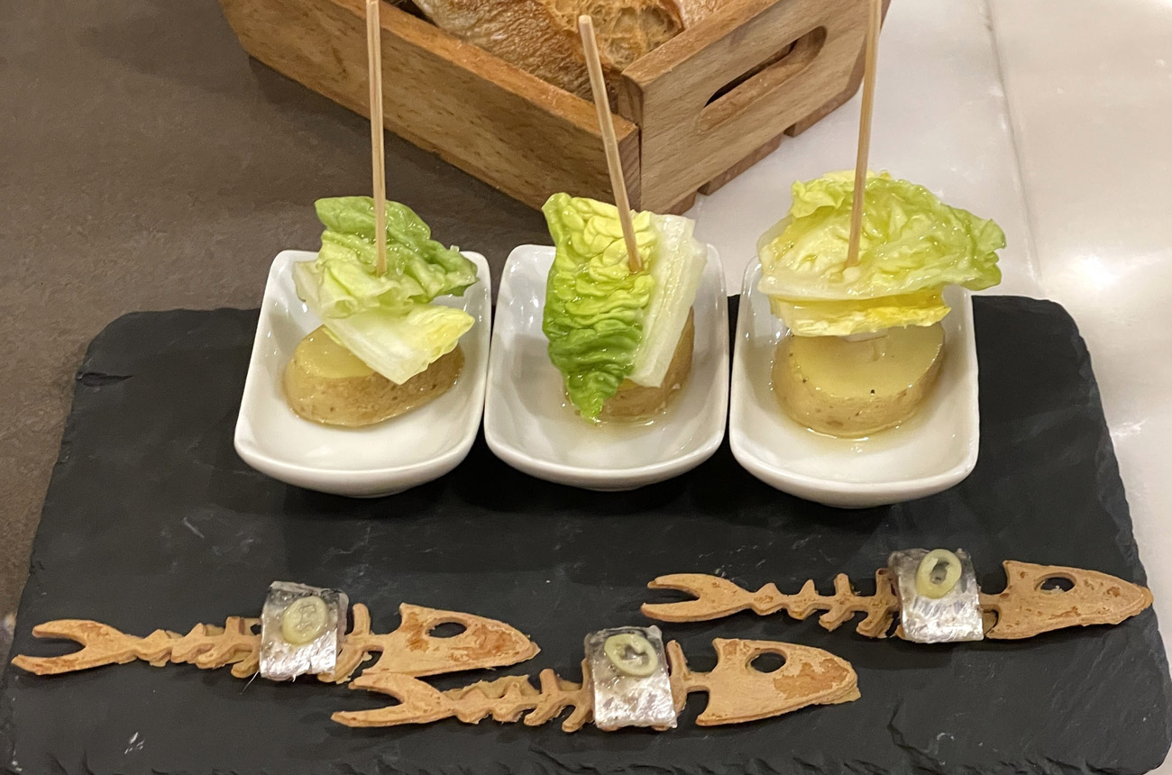 Small Tapas dishes on a slate platter