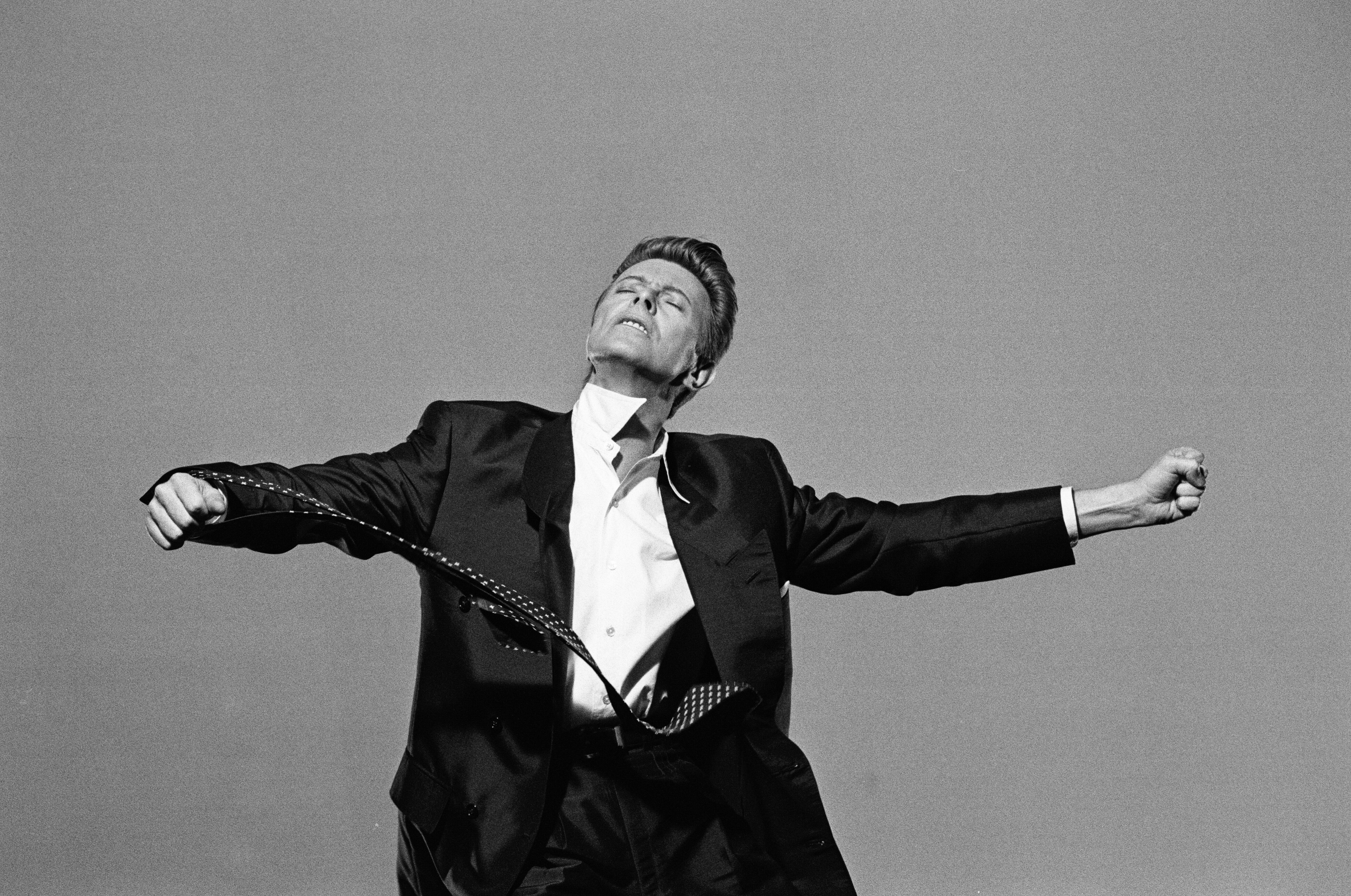 David Bowie in black and white suit