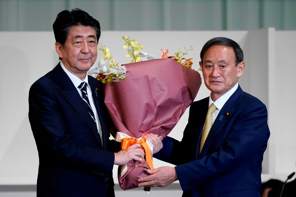 Shinzo Abe and his successor, Yoshihide Suga