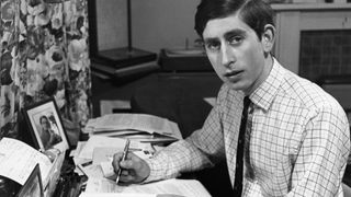 Prince Charles at work in his room while at university