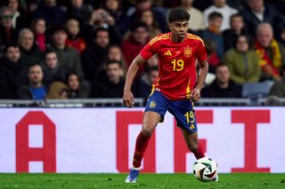 Lamine Yamal of Spain Euro 2024 squad runs with the ball during the international friendly match between Spain and Brazil at Estadio Santiago Bernabeu on March 26, 2024 in Madrid, Spain. (Photo by Diego Souto/Getty Images)