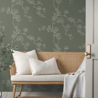 A room with floral wallpaper by Magnolia Home by Joanna Gaines