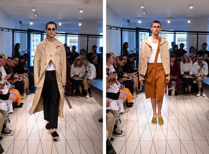 two male models at London Fashion week wearing Chalayan clothes