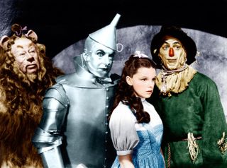 the lion tinman dorothy and the scarcrow as they visit the wizard in Wizard of oz