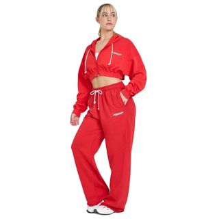 model wearing red oner active jogger set with cropped hoodie